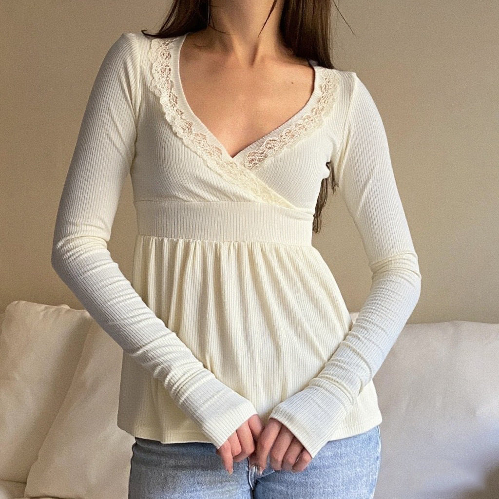Women's ivory high-waisted shirt, long sleeves, ribbed knit, lace-trim V-neck