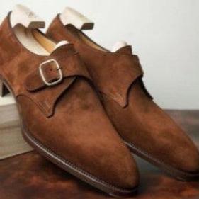 Men's brown suede buckle loafer shoes, side view with low heel