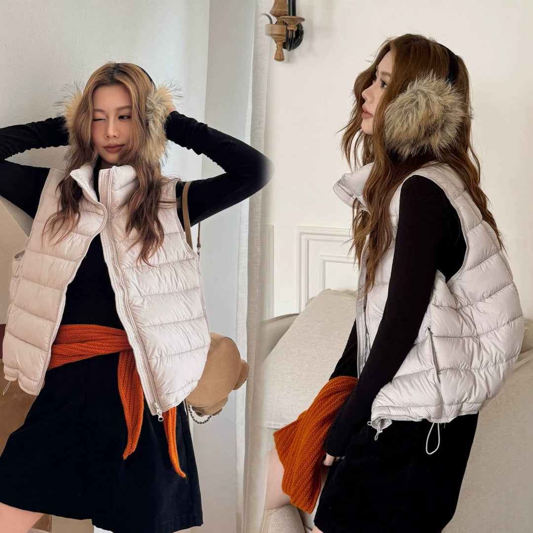 Women's light padded sleeveless vest with faux-fur hood trim and front zipper