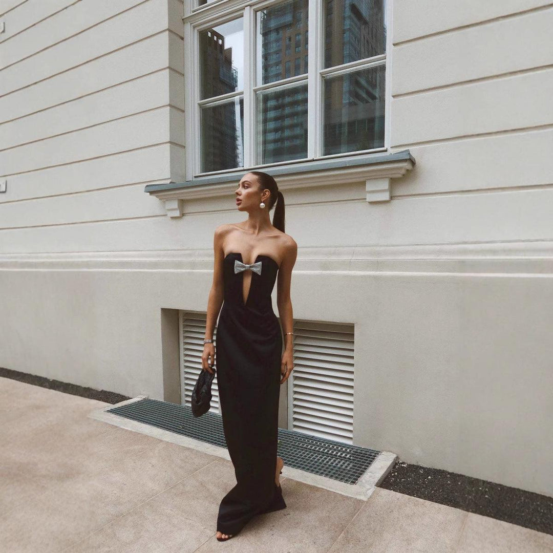 Black strapless bandeau party dress with super deep V and slim fit, bow detail