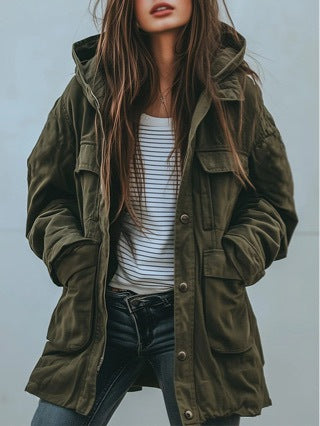 Green workwear windbreaker jacket with snap front and utility pocket tabs