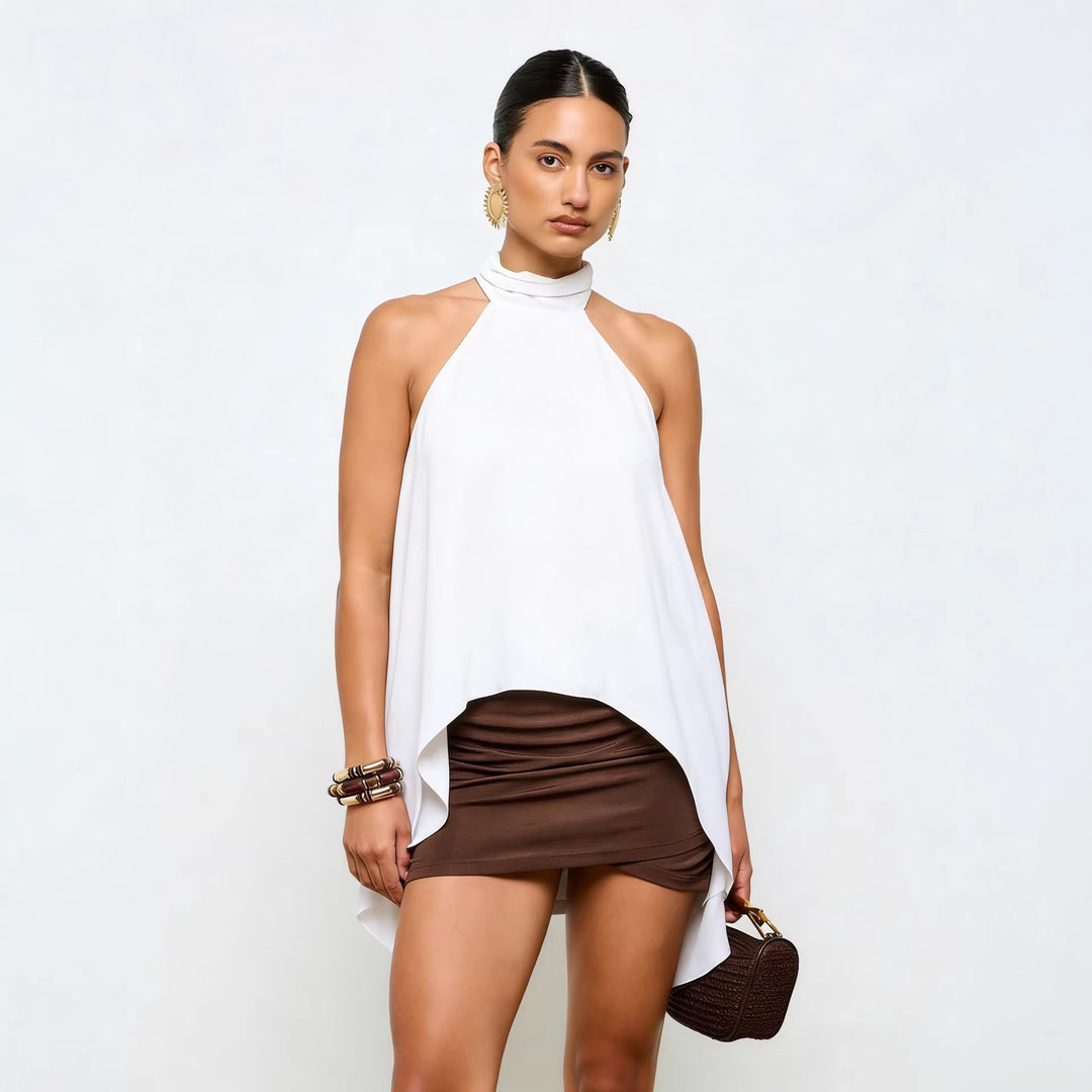 White halter cropped top with high neck and draped asymmetric hem