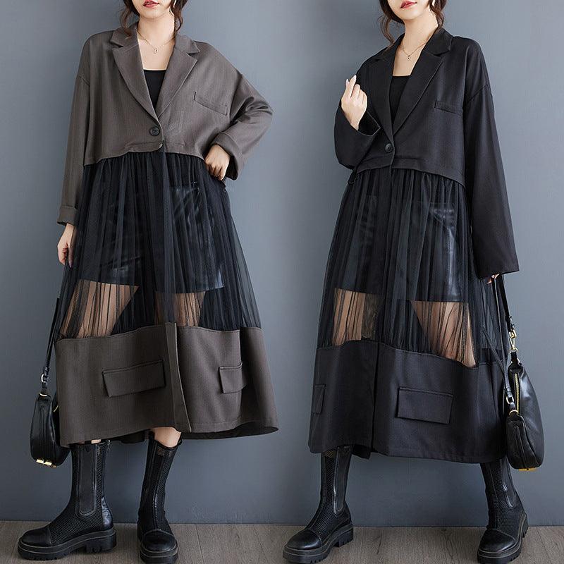 A-line patchwork mesh skirt in dark gray/black with sheer paneling and front pockets