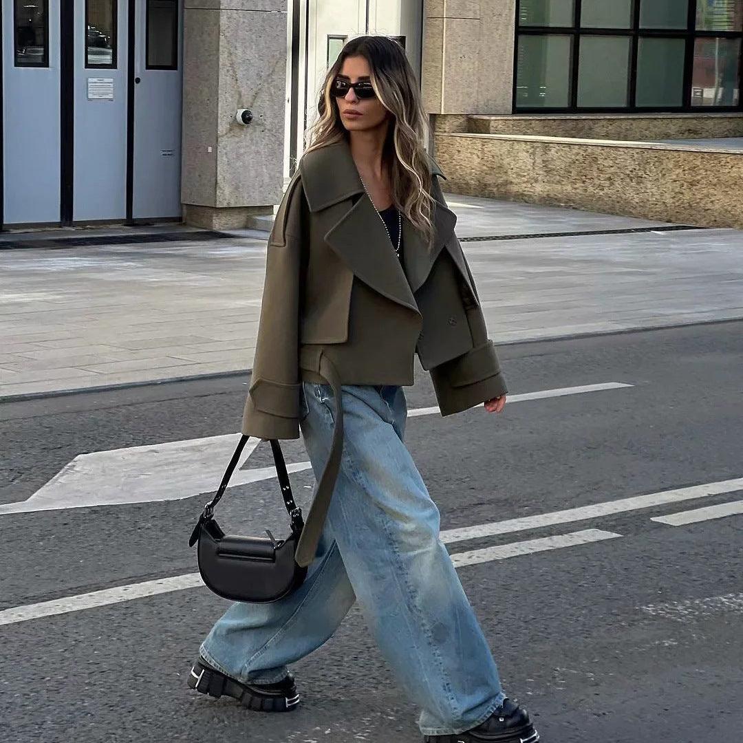 Camel short wool trench coat with wide lapel, belt waist, and long sleeves