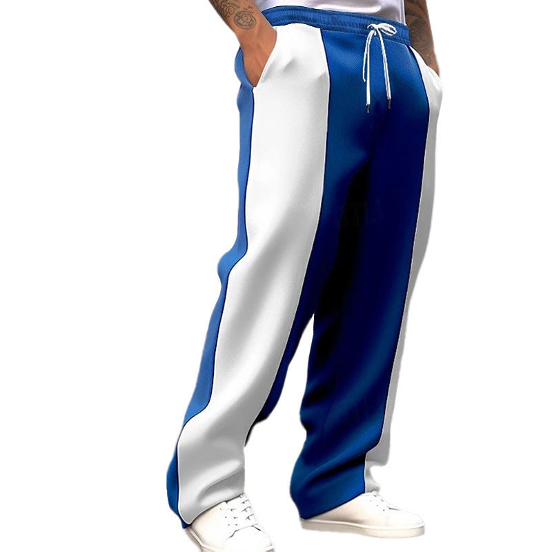 Men's blue track trousers with white contrast side panels, elastic drawstring waist.