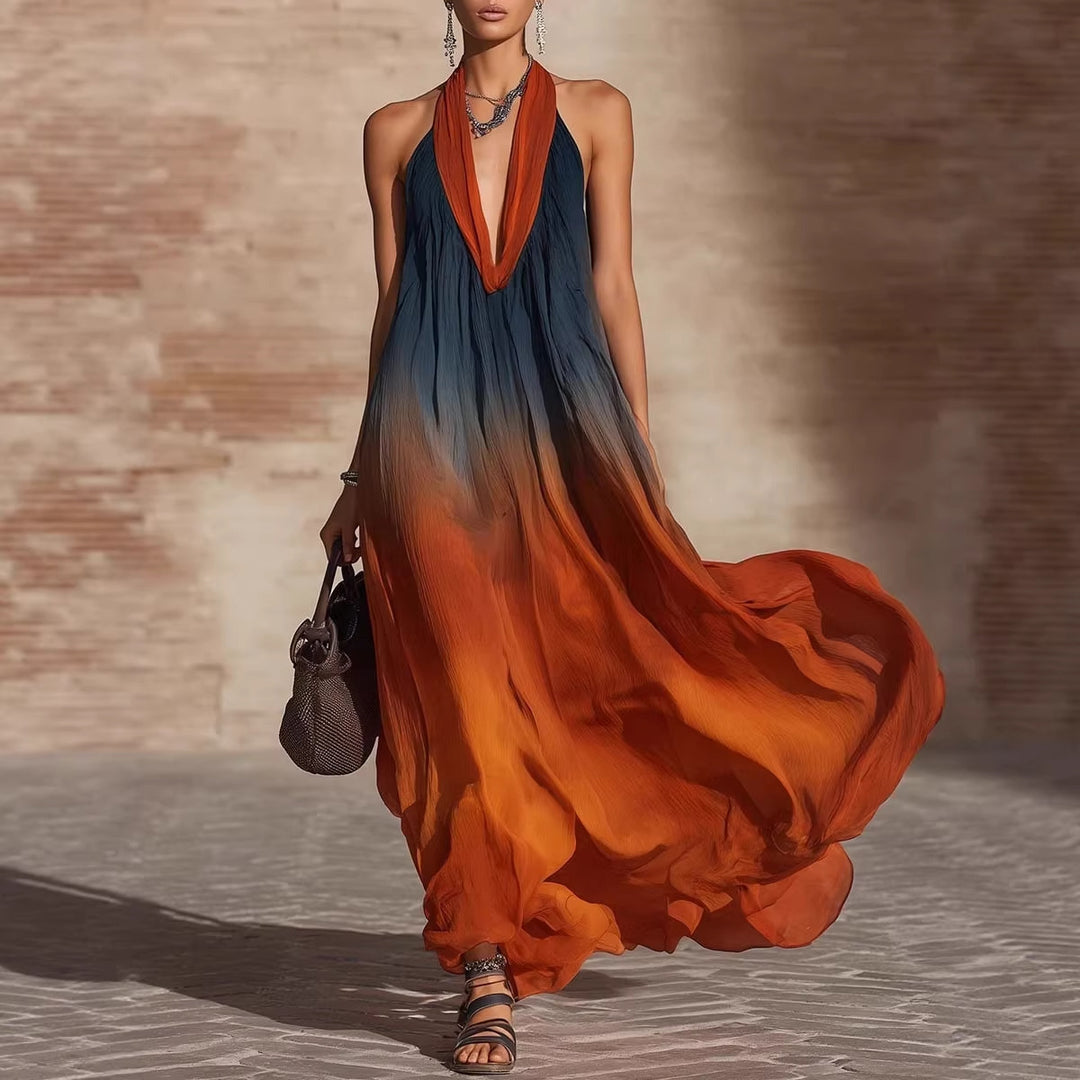 Sleeveless V-neck maxi dress in orange and dark blue with flowing, tiered skirt