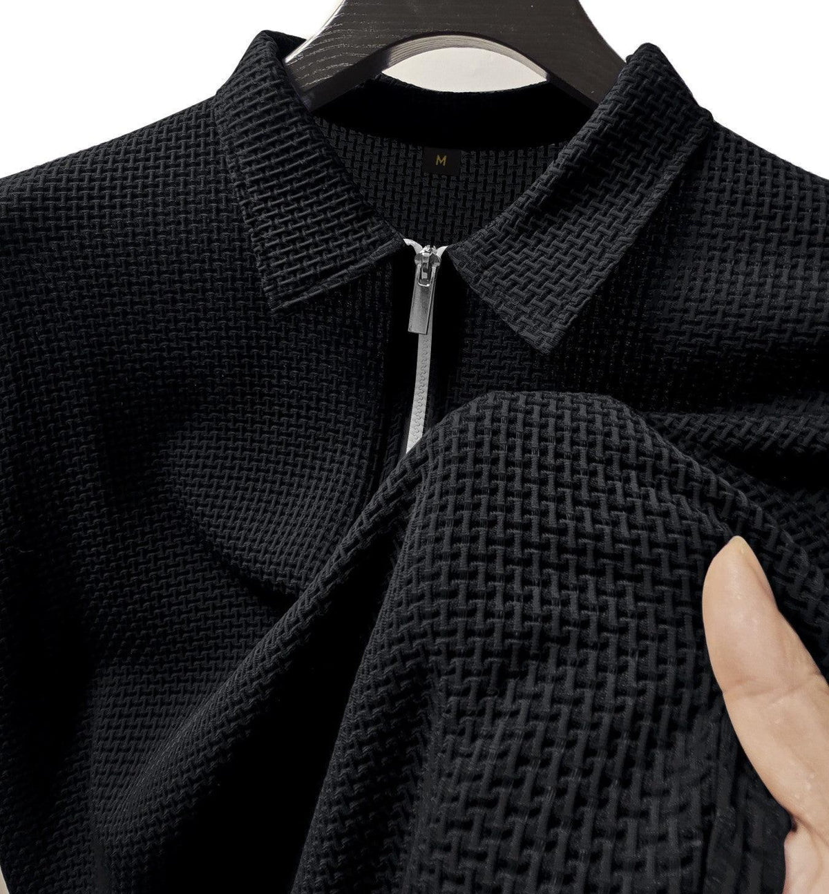 Men's black textured zip-front casual top with zip stand collar
