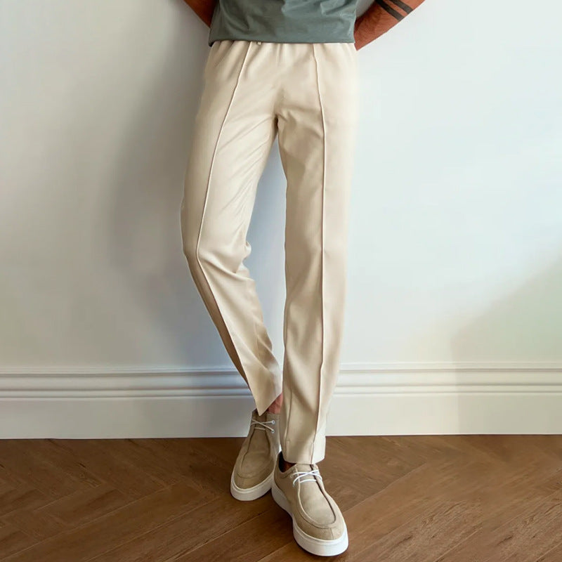 Men's pleated twill slim-fit tapered pants with elastic waist, khaki-beige