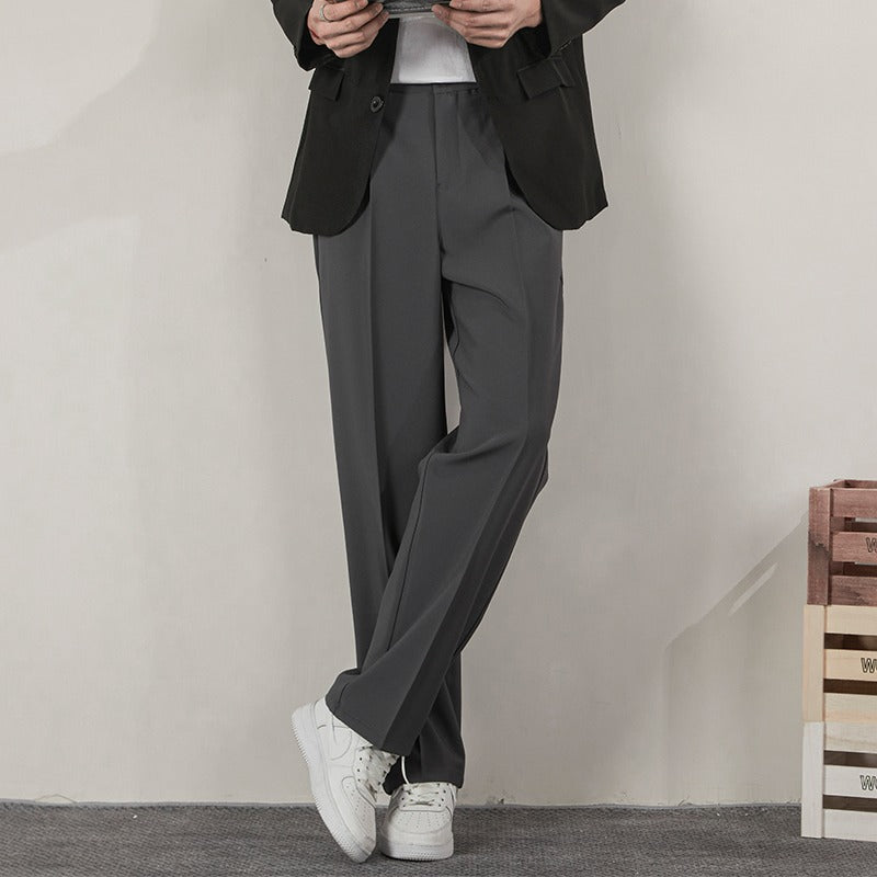Men's charcoal straight-leg suit trousers with pleats and belt loops