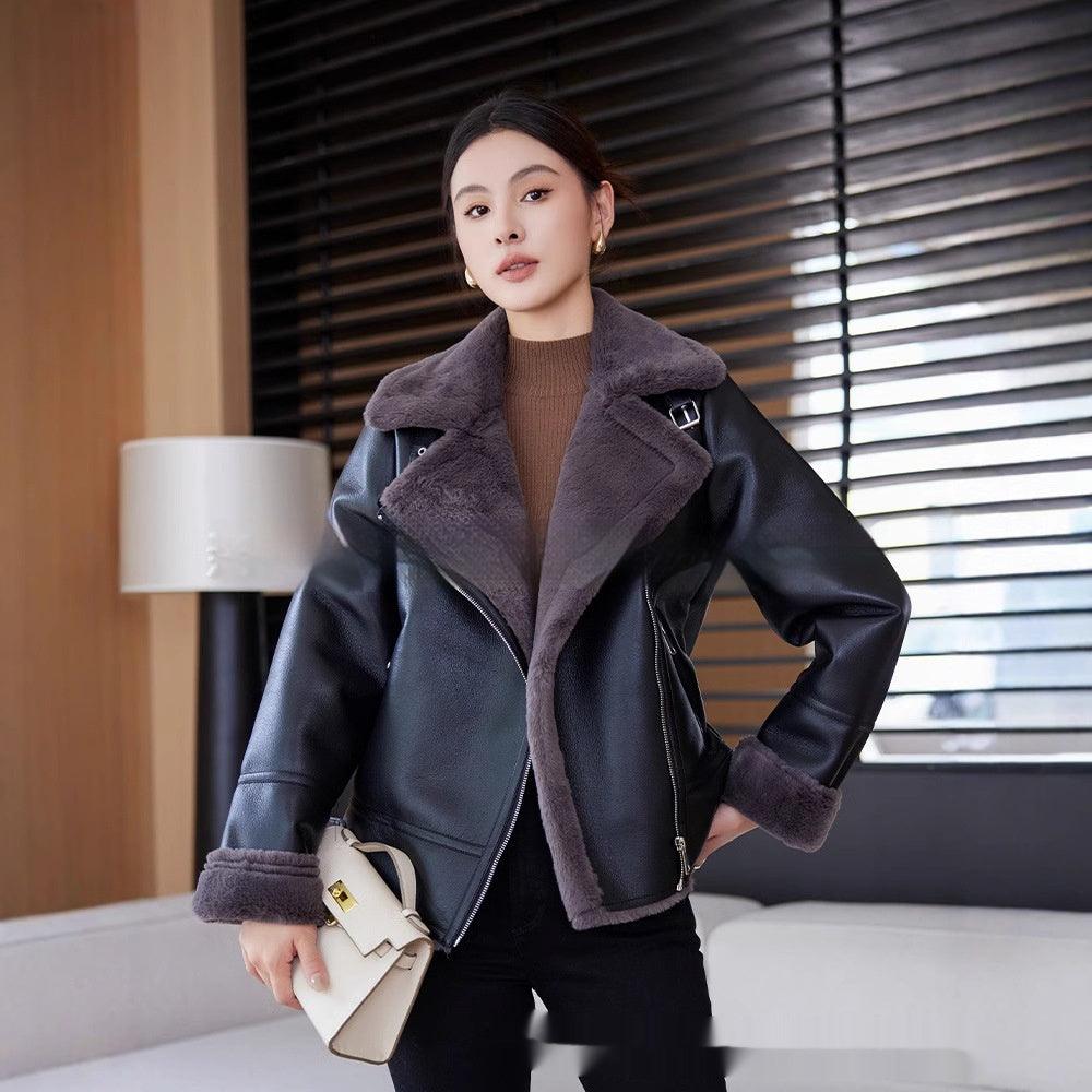 Women’s dark lamb coat with shearling collar, zip front, and fuzzy cuffs