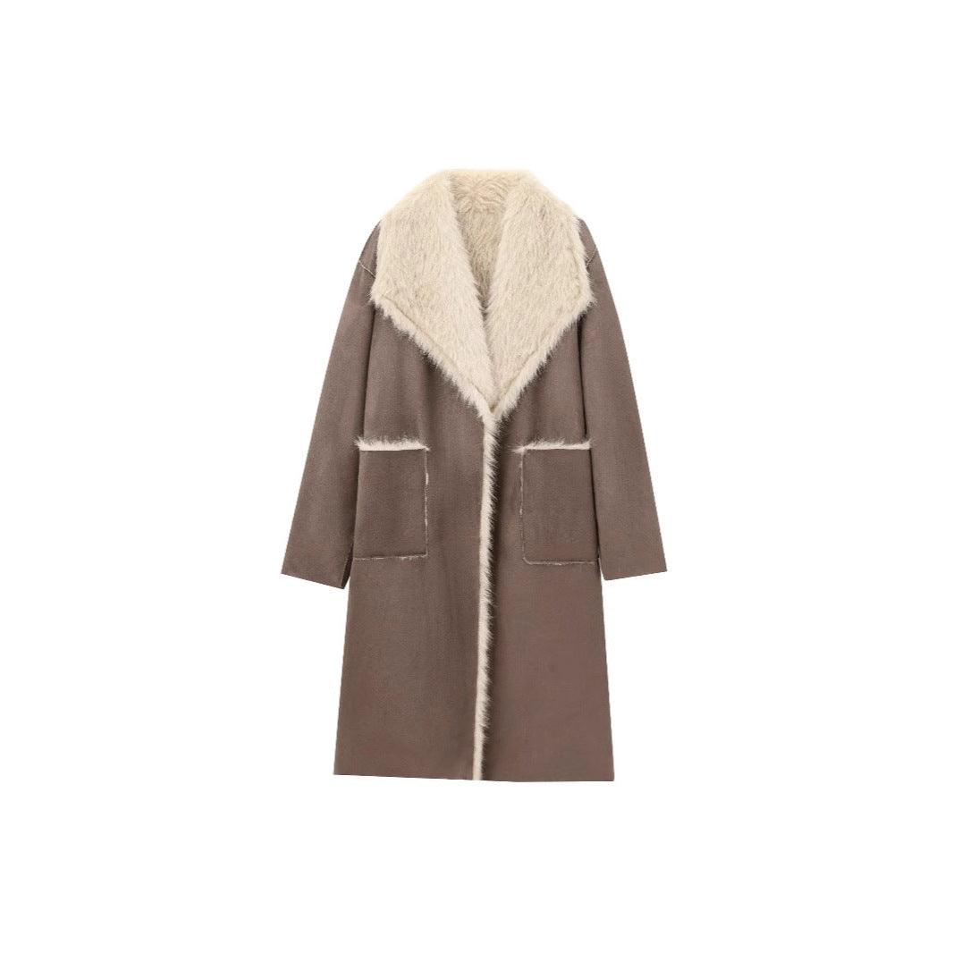 Two-tone long coat with turn-down collar, faux fur trim, and patch pockets