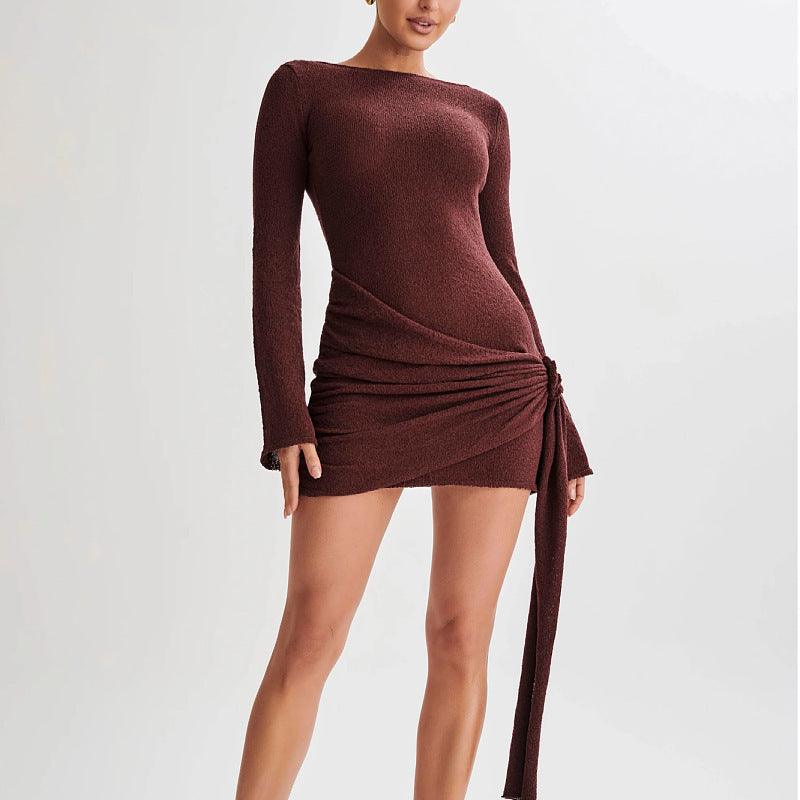 Deep burgundy slim long-sleeve mini dress with ruched side and tied drape