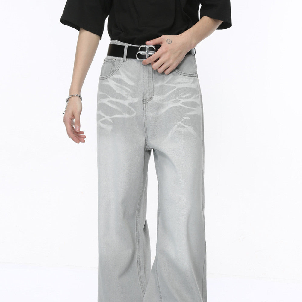Light gray straight loose jeans with belt loops, button fly, and front pockets