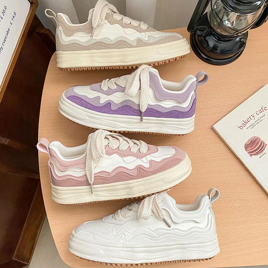 Purple and white platform sneakers with cream laces and chunky sole