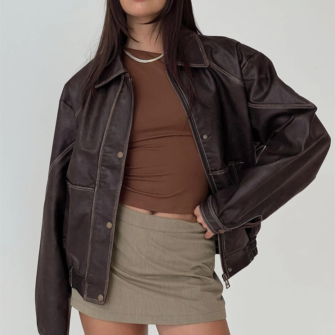 Women's brown mid-length faux leather biker jacket