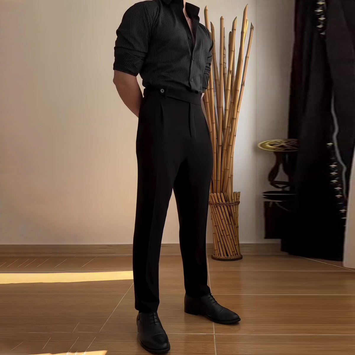 Black straight-leg business casual pants with button closure and side pockets
