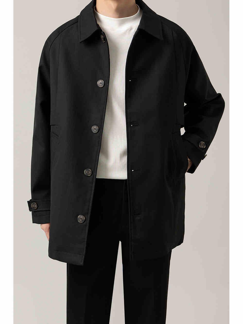 Men's black loose lapel jacket with button front and flap chest pockets