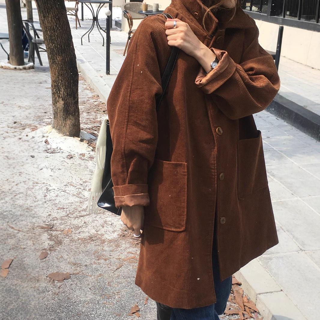 Brown corduroy lapel single-breasted coat with button front and two chest pockets