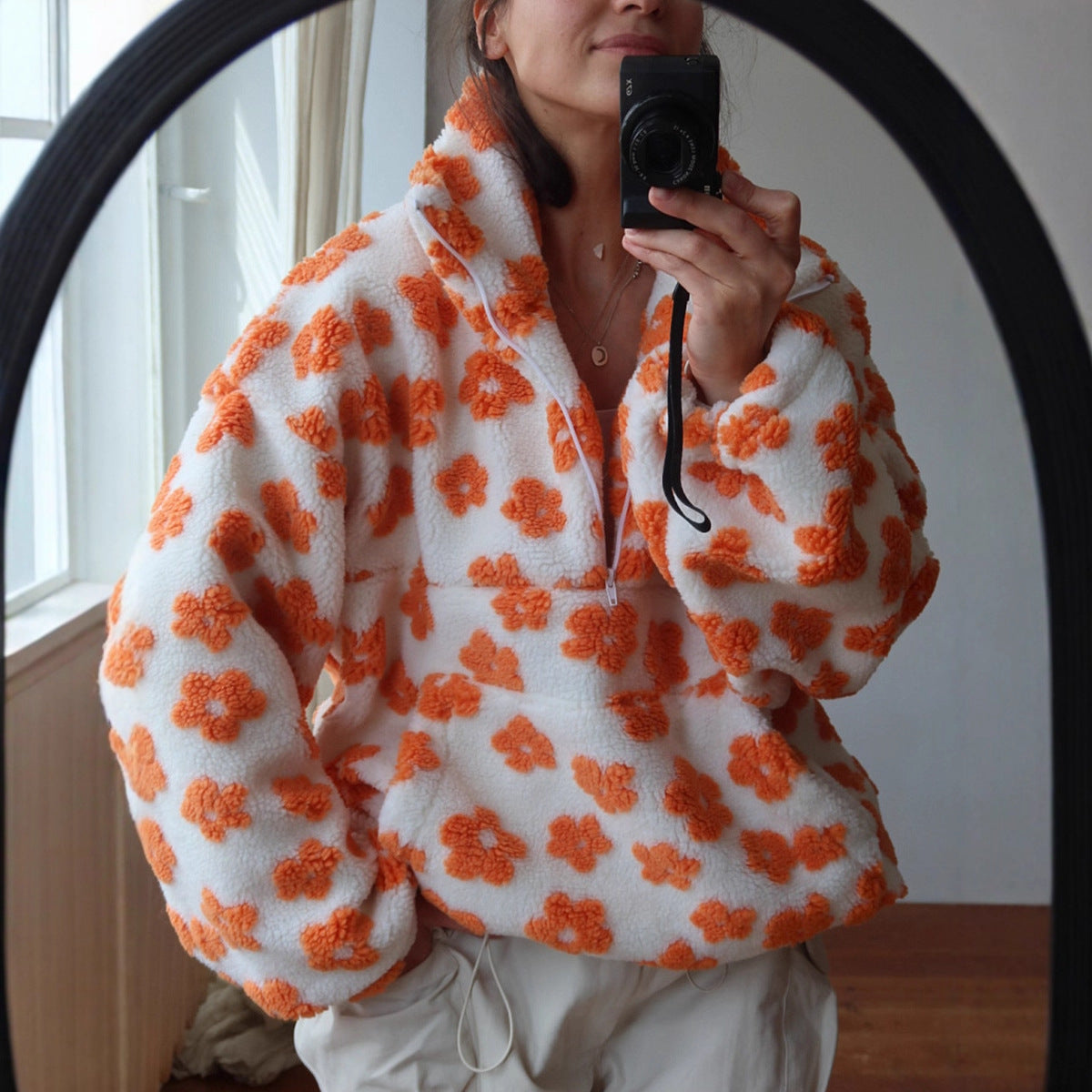 Women's floral zip-neck pocket sweatshirt