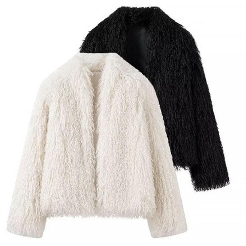 Two-tone shaggy jacket with white body and black sleeves, short cropped silhouette