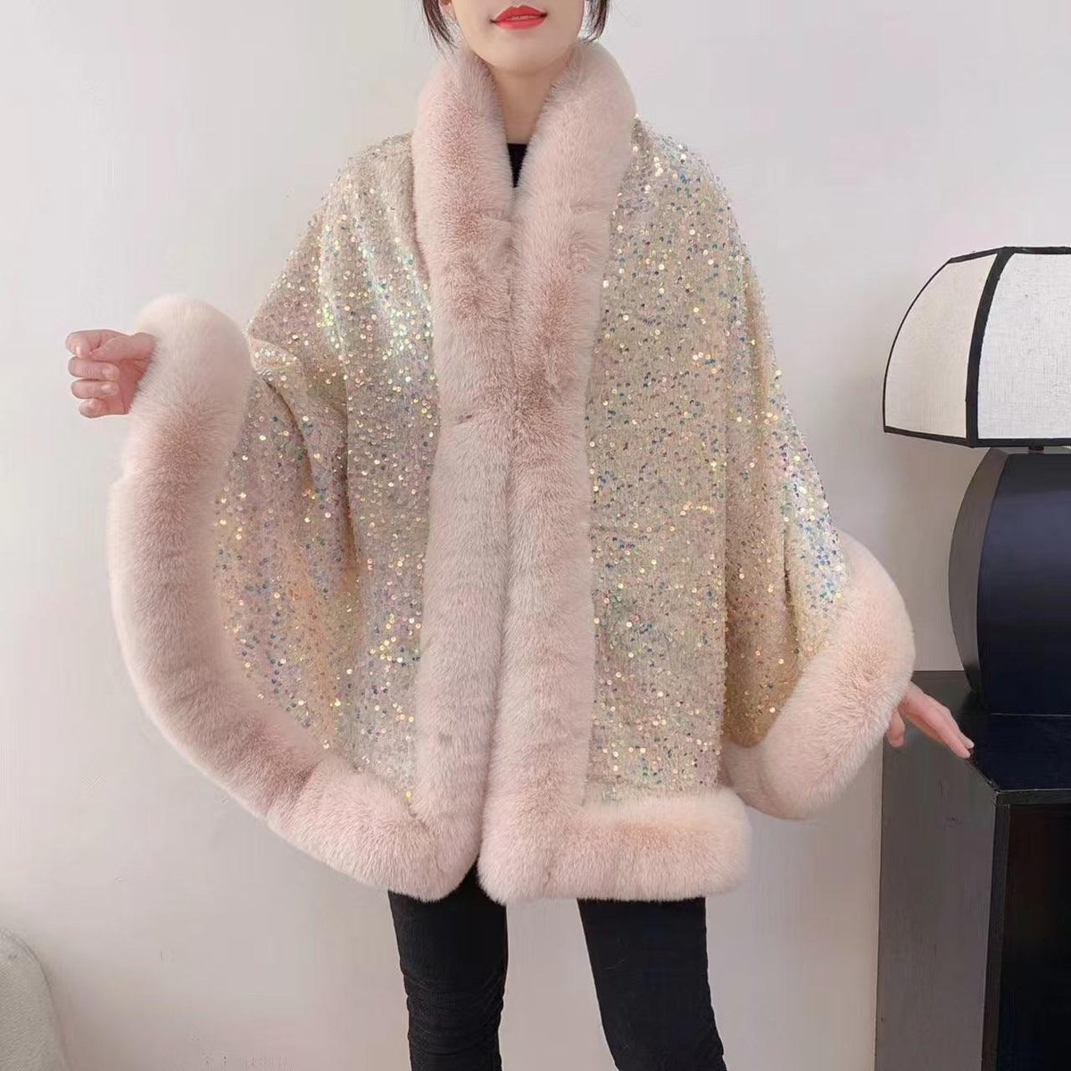 Beige sequined shawl with oversized faux-fur collar and fleece lining, fur-trim cuffs