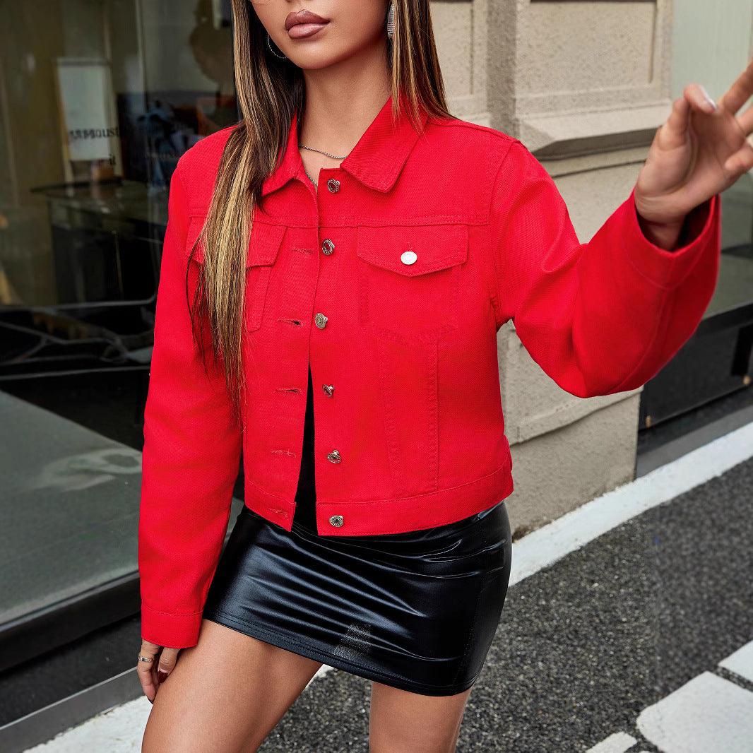Red denim jacket with pointed collar, button front, and flap chest pockets
