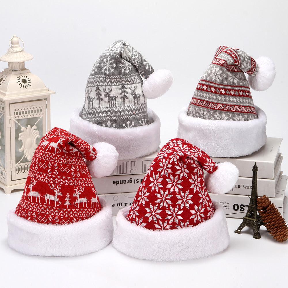 Set of Christmas knit hats with pom-pom trim, gray and red deer/snowflake patterns