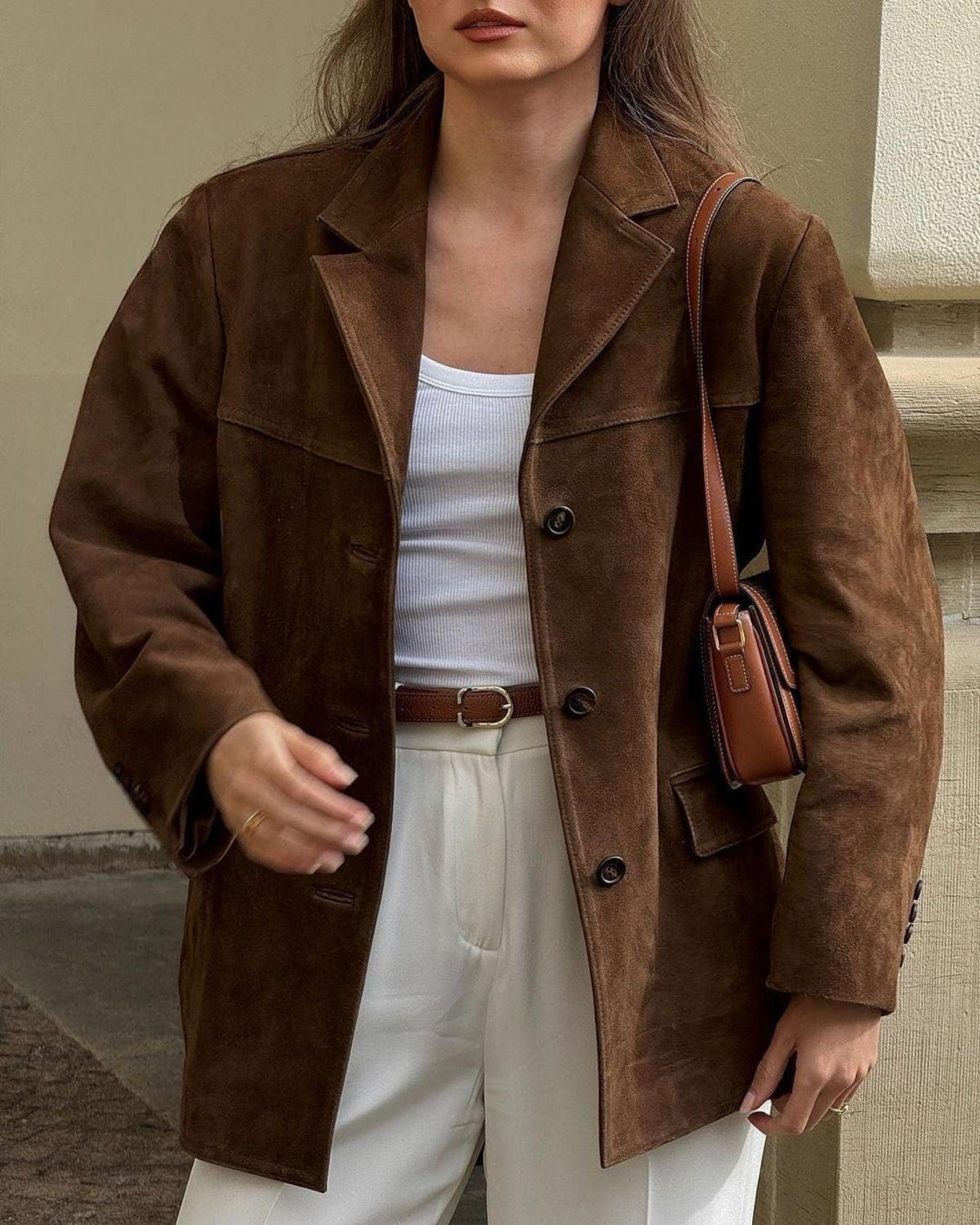 Brown faux suede jacket with notch lapel, double-button front detail, flap pockets