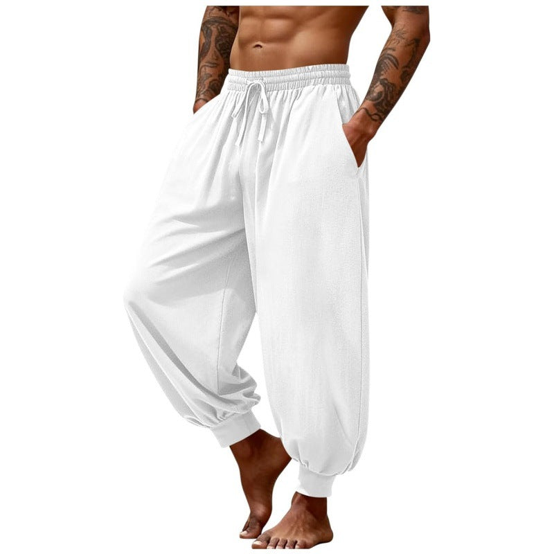 Men's breathable casual pants in white, elastic waistband with drawstring, relaxed tapered fit.