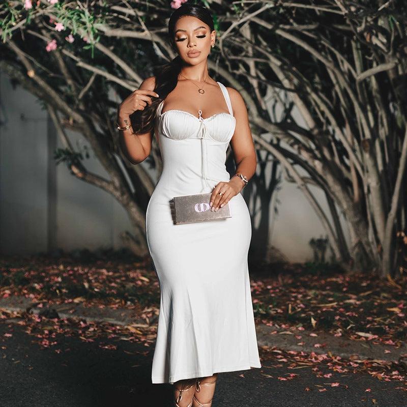 White spaghetti-strap off-shoulder midi dress with fitted bust and flared skirt