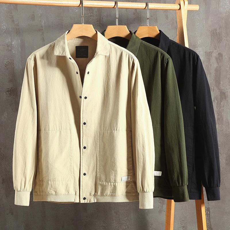 Men's shirt-coat jackets in light, olive, and black, shown on hangers