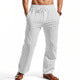 White linen beach shorts, side view, drawstring waist and straight legs