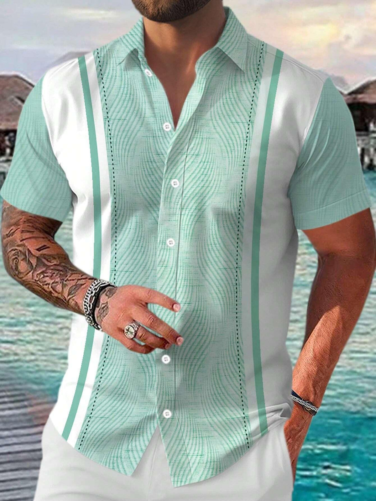 Mint green short-sleeve button-up shirt with vertical stripe panels and subtle texture.