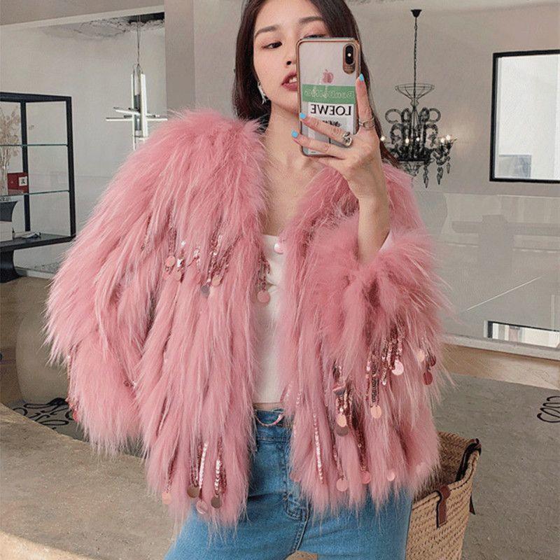 Pink faux fur tassel coat with long fringe and hanging bead details