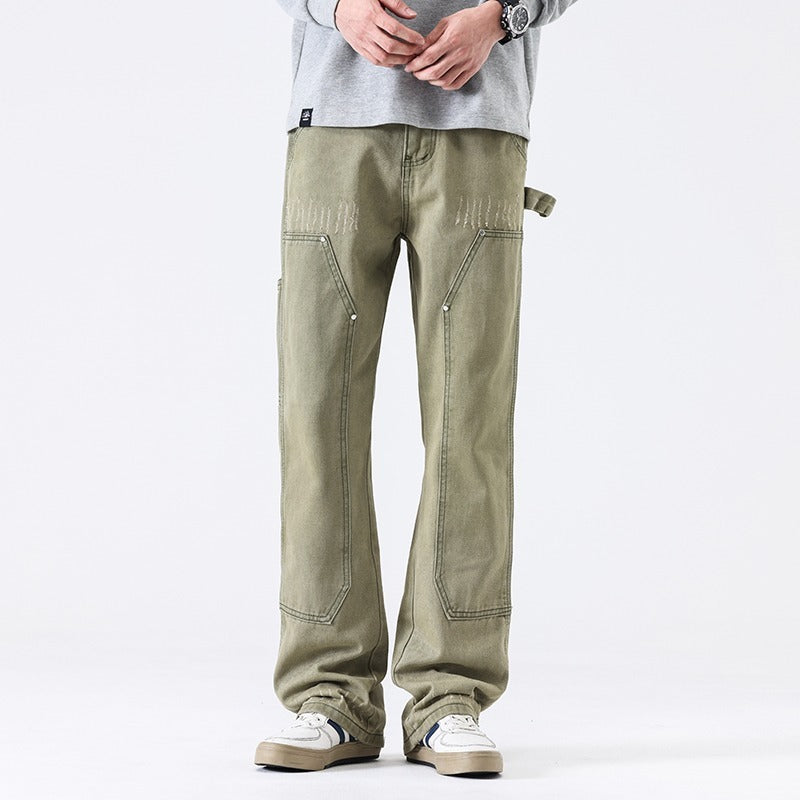 Army green distressed wide-leg jeans featuring cargo pocket details and seam stitching
