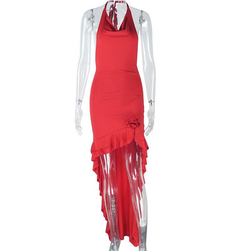Red halter fishtail dress on white, ruched fitted body with layered ruffle hem