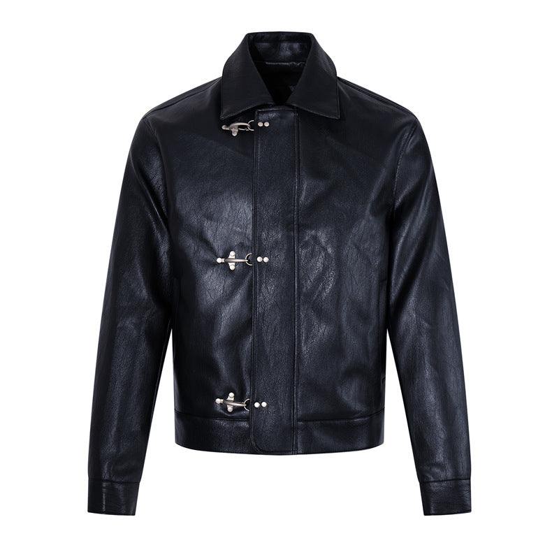 Black glossy faux leather biker jacket, stand collar, snap buckle front fastening.