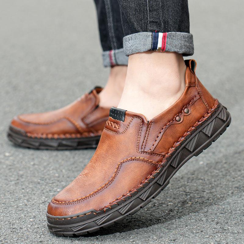Brown slip-on casual shoes with side stitch detailing and textured rubber outsole