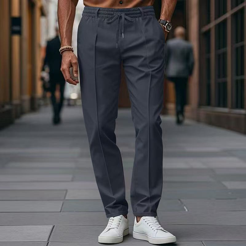 Men's straight-leg dark blue sweatpants with elastic waistband, drawstring, and side pockets