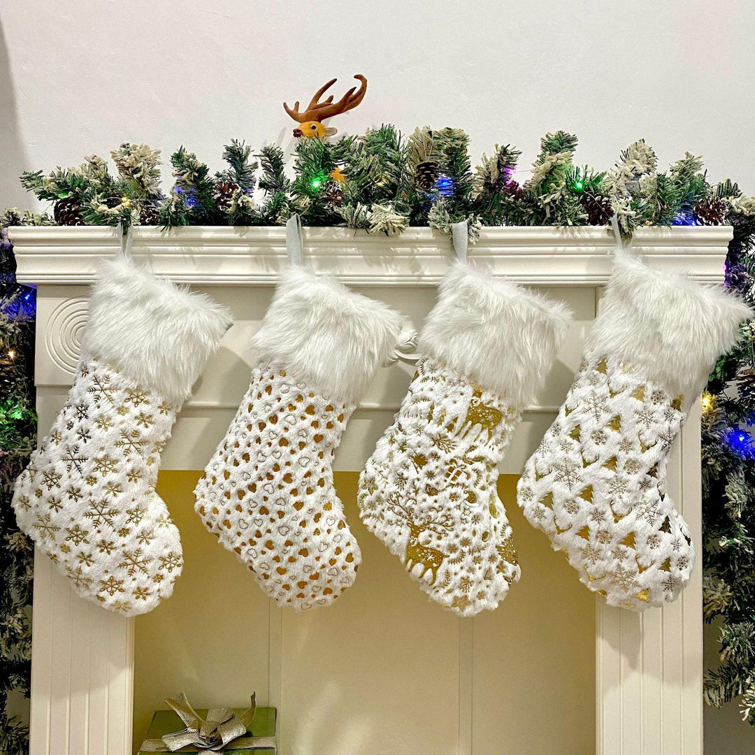 Set of 4 plush Christmas stockings, white with gold snowflake print and fluffy cuffs