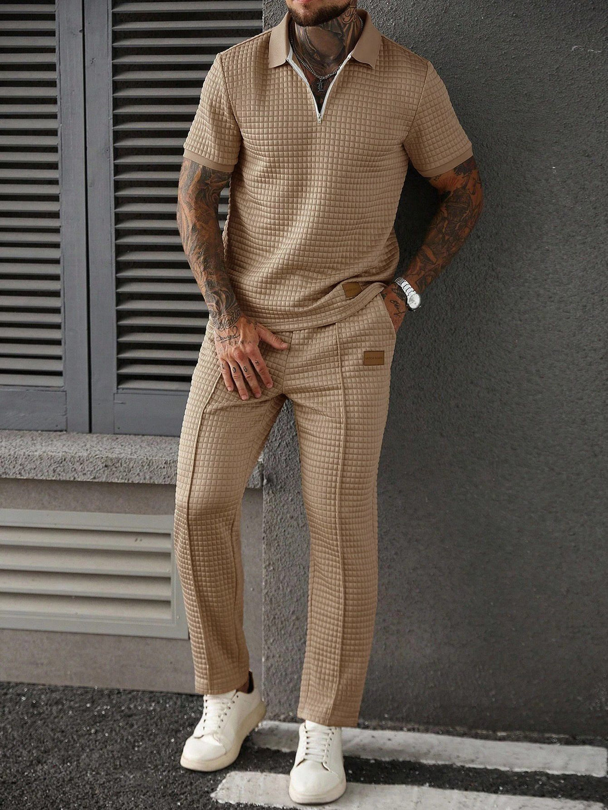 Men's half-zip polo shirt and pants set in khaki with short sleeves and drawstring waist.