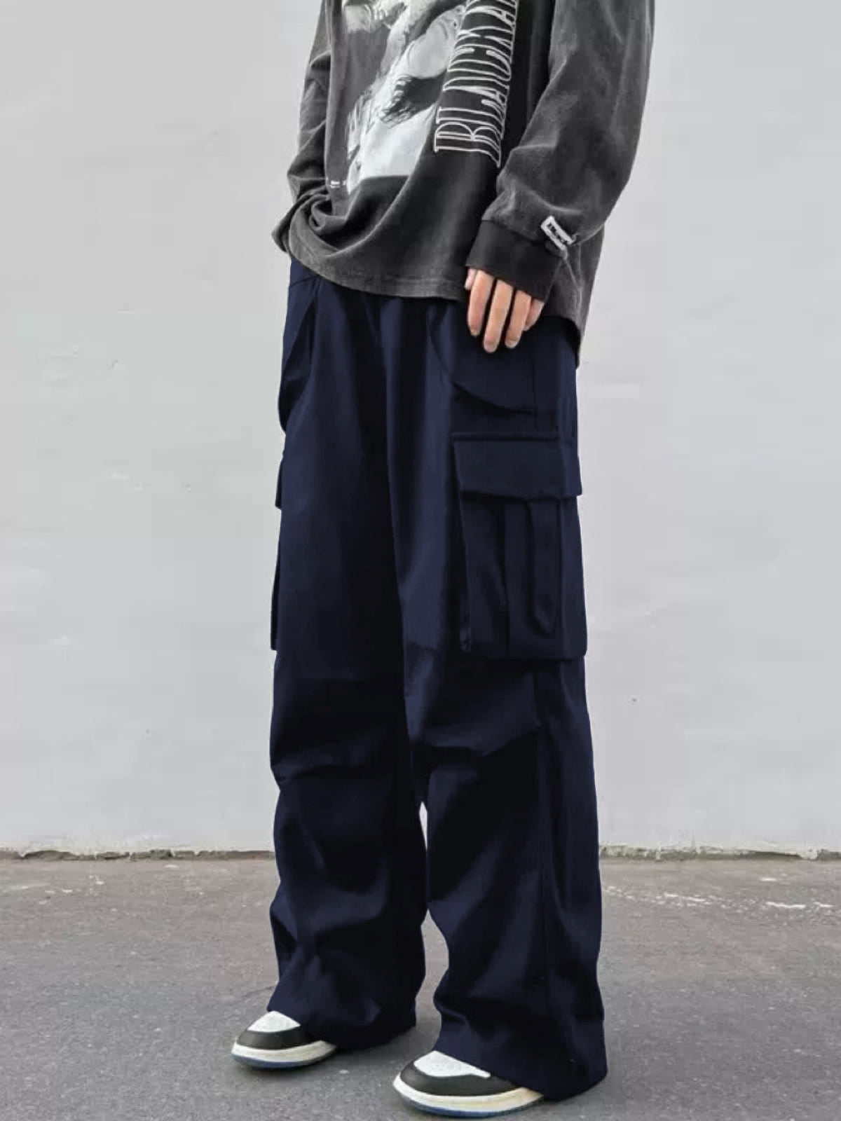 Navy blue wide-leg trousers with cargo flap side pockets