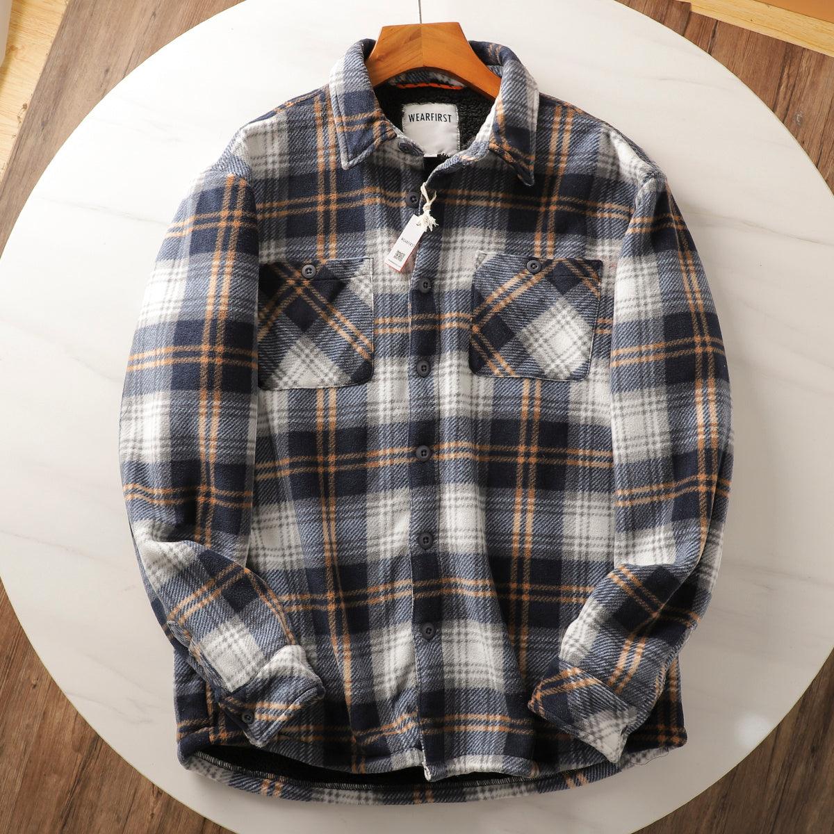 White, navy, and orange plaid cotton-padded coat on hanger with button-front pockets