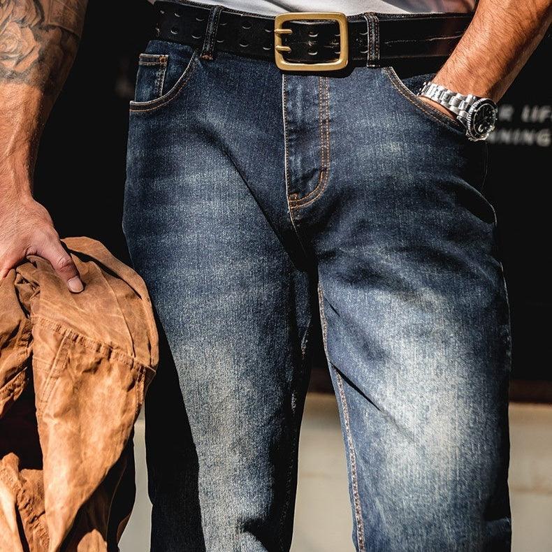 Washed denim straight jeans in medium blue with belt loops and button fly