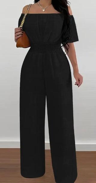 Black off-shoulder short-sleeve jumpsuit with cinched waist and wide-leg pants