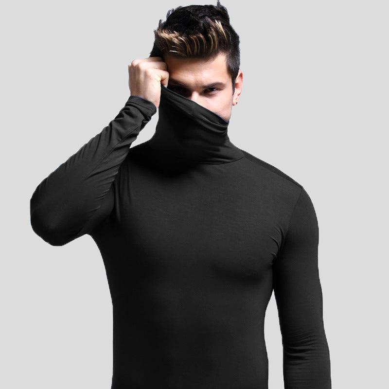 Black long-sleeve thermal base shirt with high mock neck, close fit