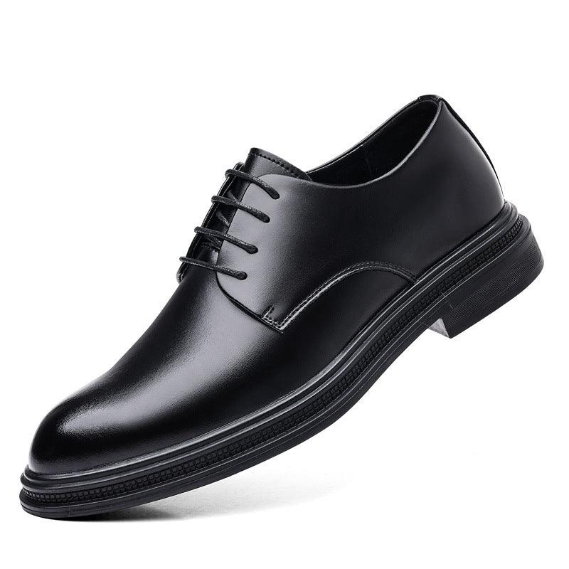 Black leather lace-up dress shoe with cap toe seam and low stacked heel profile.