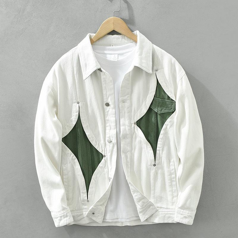 White button-up jacket with green abstract panel accents, long sleeves
