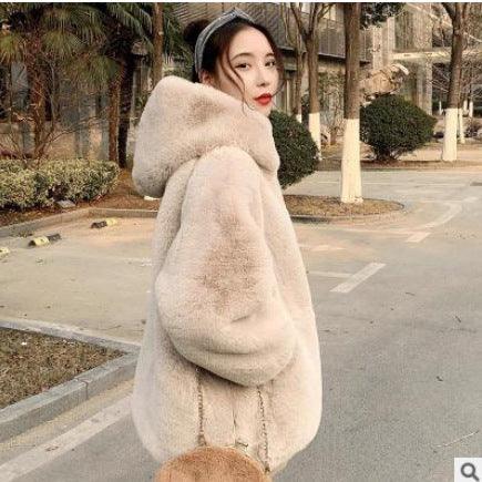 Women’s hooded fur jacket in light beige, thick plush texture with long sleeves and hood