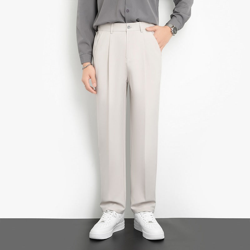 Men's light gray straight-leg suit trousers with pleated front and belt loops